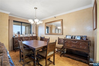 Welcome to Residence 14R at the Atrium, a beautifully maintained