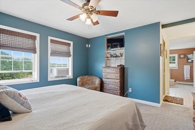 Set on 1.17 private acres in the heart of Grand Isle, this - photo 14