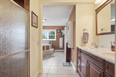Set on 1.17 private acres in the heart of Grand Isle, this - photo 15