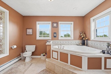 Set on 1.17 private acres in the heart of Grand Isle, this - photo 16