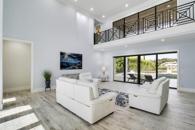 Set along the scenic Loxahatchee River within the prestigious - photo 18