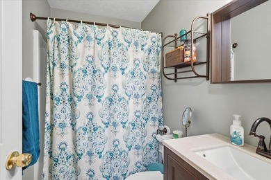 Set on 1.17 private acres in the heart of Grand Isle, this - photo 19