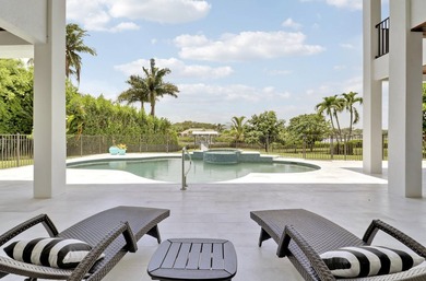 Set along the scenic Loxahatchee River within the prestigious - photo 20