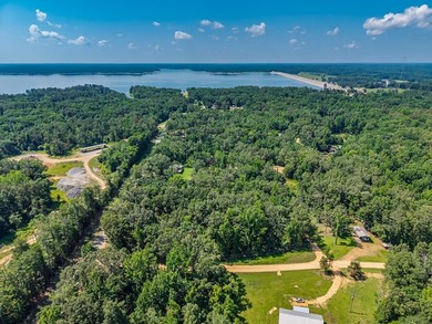 Enid Lake!! 4 lots approved for 4 houses/cabins. Has road - photo 4