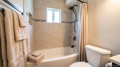 Welcome to this charming expanded home nestled on a quiet block - photo 12
