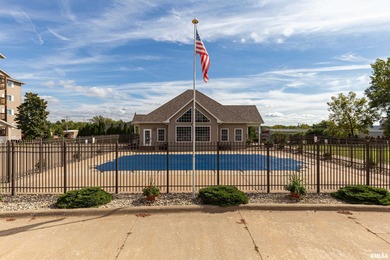 Fresh paint. Spacious and move-in ready, this second-floor condo