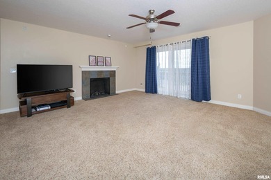 Fresh paint. Spacious and move-in ready, this second-floor condo