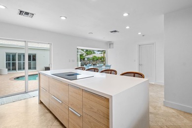 Welcome to this exceptional single-story waterfront residence in - photo 13