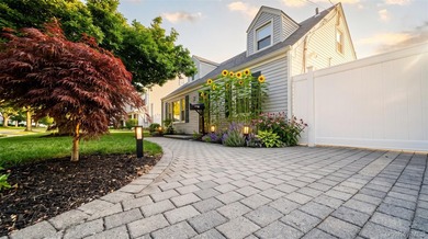 Welcome to this charming expanded home nestled on a quiet block - photo 15