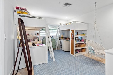 Welcome to this exceptional single-story waterfront residence in - photo 16