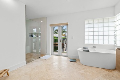 Welcome to this exceptional single-story waterfront residence in - photo 22