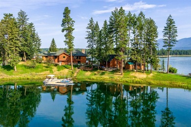 Set on a spectacular peninsula on Echo Lake, this beautifully - photo 1