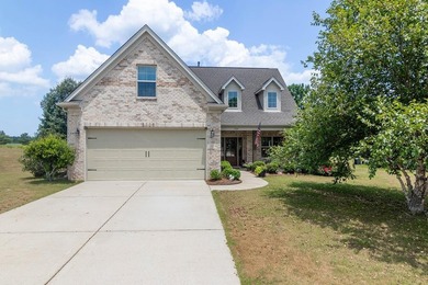Tucked into The Lakes subdivision on 1.9 acres that includes - photo 1