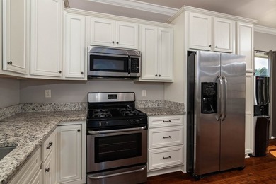 Tucked into The Lakes subdivision on 1.9 acres that includes - photo 4