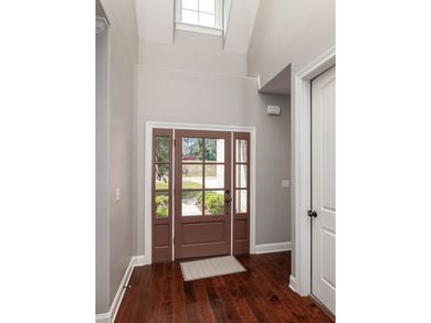 Tucked into The Lakes subdivision on 1.9 acres that includes - photo 9