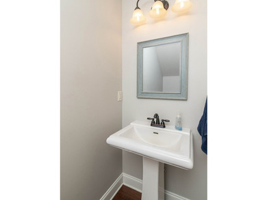 Tucked into The Lakes subdivision on 1.9 acres that includes - photo 10