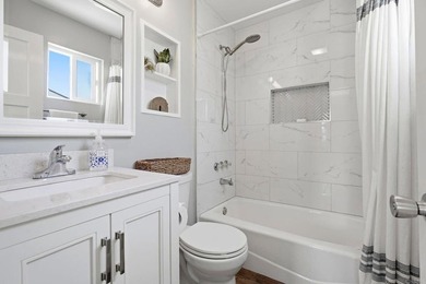 Less than two miles from the beach, the bay, and Liberty Station - photo 12