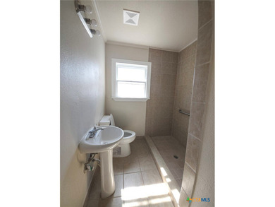 Beautifully updated 6-bedroom, 3-bath home with two living rooms