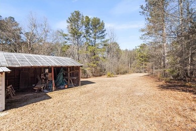 Discover the potential of this beautiful four-sided brick ranch