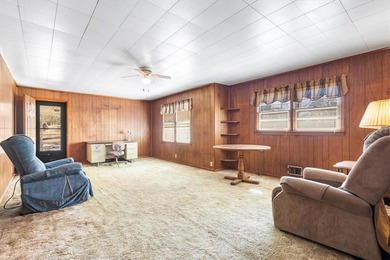 Discover the potential of this beautiful four-sided brick ranch