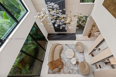 Welcome to the Modani Residence, a showcase of modern design and - photo 21