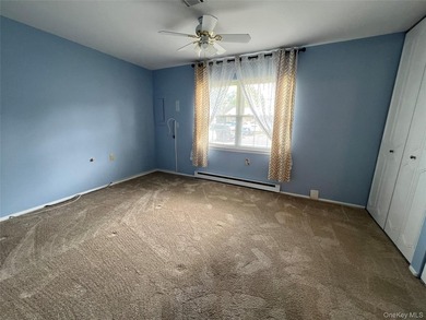 Lovely one bedroom condo in a pretty location. Sunroom wall was - photo 11