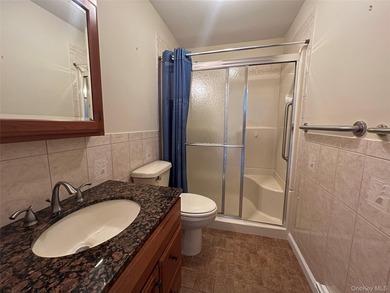 Lovely one bedroom condo in a pretty location. Sunroom wall was - photo 12