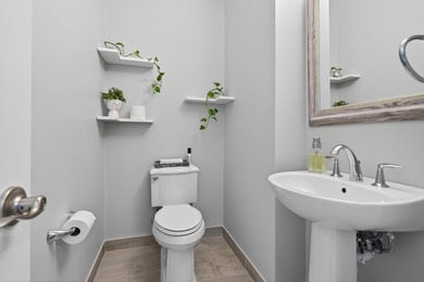 Beautifully upgraded 4BR / 2.5BA corner unit featuring an - photo 12