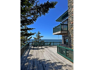 Perched high atop dramatic granite cliffs on Maine's Bold Coast - photo 3