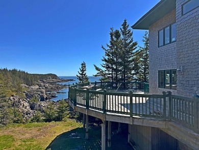 Perched high atop dramatic granite cliffs on Maine's Bold Coast - photo 4