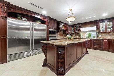 Stunning two-story estate in Miami on nearly an acre, featuring - photo 22