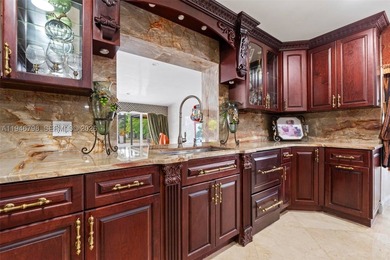Stunning two-story estate in Miami on nearly an acre, featuring - photo 25