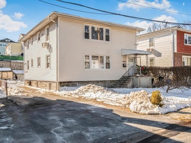 Beautiful fully detached legal 2-family home located in the - photo 1