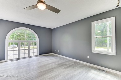 Home with in-ground pool on spacious lot near Jones Lake in - photo 24