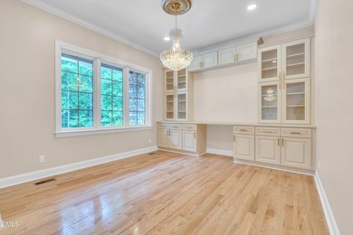 Nestled within the prestigious gated community of Governor's - photo 7