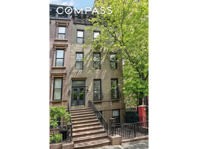 This four-story turn of the century Brownstone is presently - photo 1