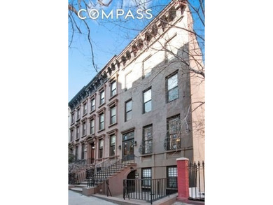 This four-story turn of the century Brownstone is presently - photo 2