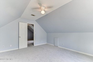 Home with in-ground pool on spacious lot near Jones Lake in - photo 44