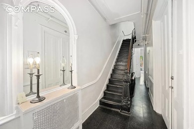 This four-story turn of the century Brownstone is presently - photo 4