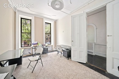 This four-story turn of the century Brownstone is presently - photo 5