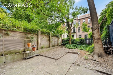 This four-story turn of the century Brownstone is presently - photo 8