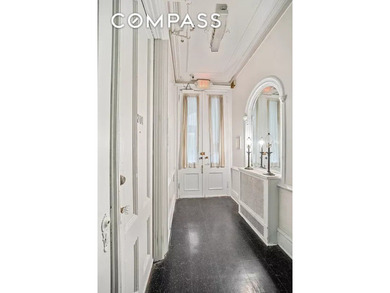 This four-story turn of the century Brownstone is presently - photo 9