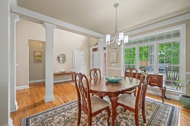 This stunning custom-built brick home in the prestigious gated - photo 11