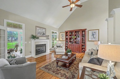 This stunning custom-built brick home in the prestigious gated - photo 12