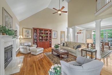 This stunning custom-built brick home in the prestigious gated - photo 13