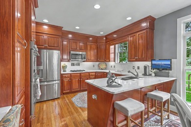 This stunning custom-built brick home in the prestigious gated - photo 17