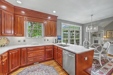 This stunning custom-built brick home in the prestigious gated - photo 19