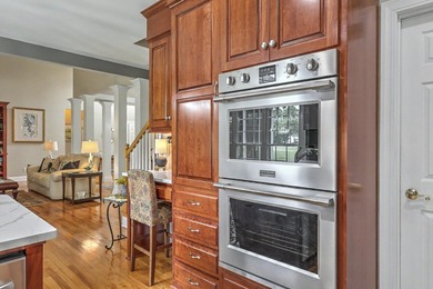 This stunning custom-built brick home in the prestigious gated - photo 20