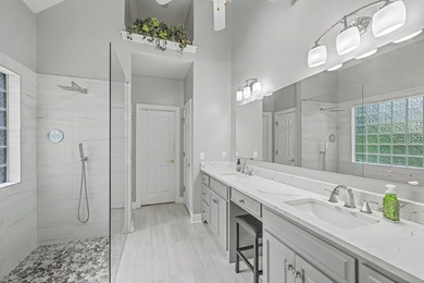 This stunning custom-built brick home in the prestigious gated - photo 26