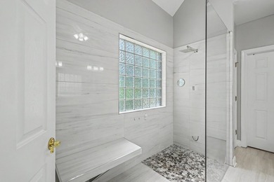 This stunning custom-built brick home in the prestigious gated - photo 27